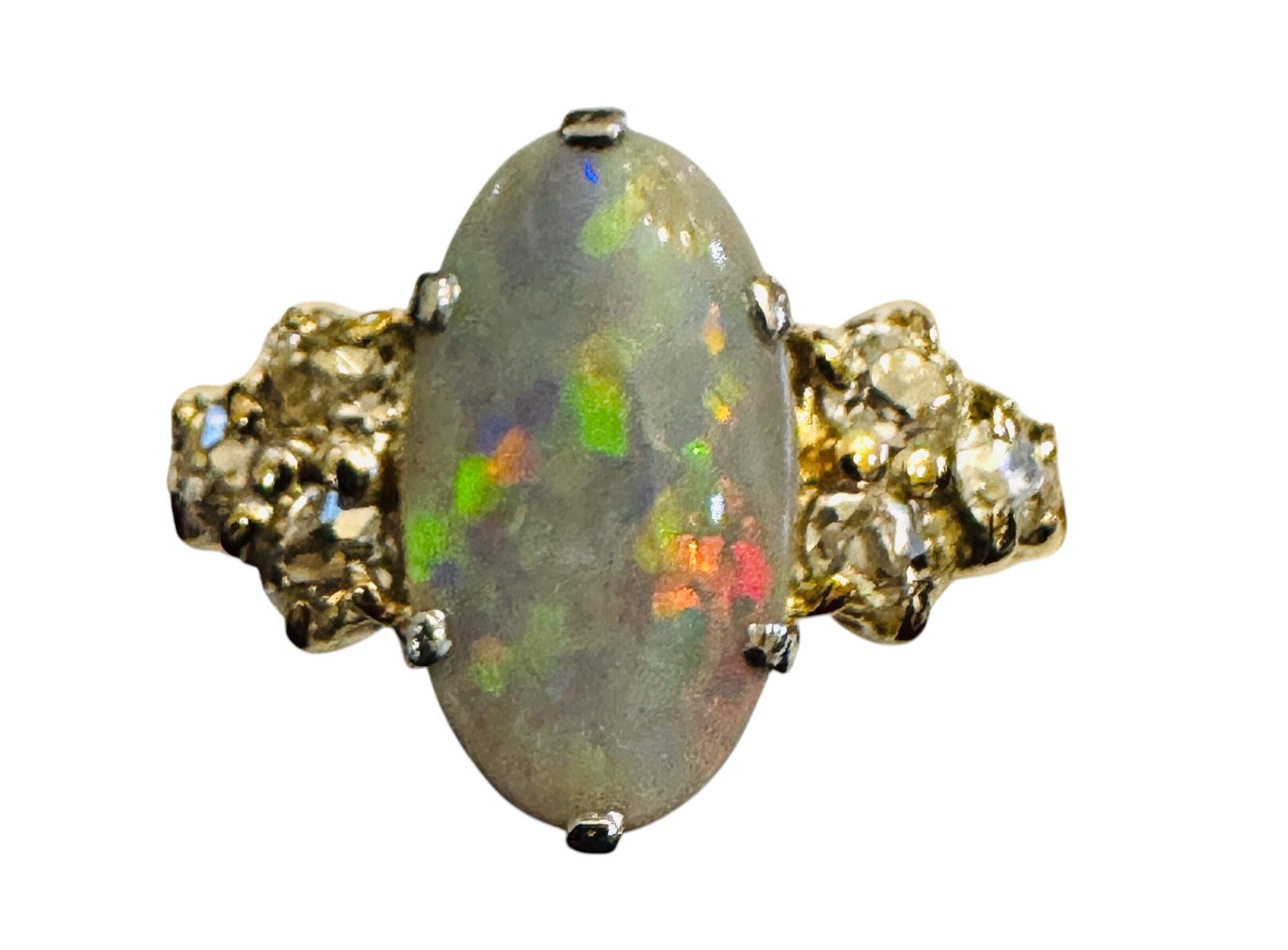 An opal and diamond cluster ring from the cabinet at T J Thornton, Market Harborough